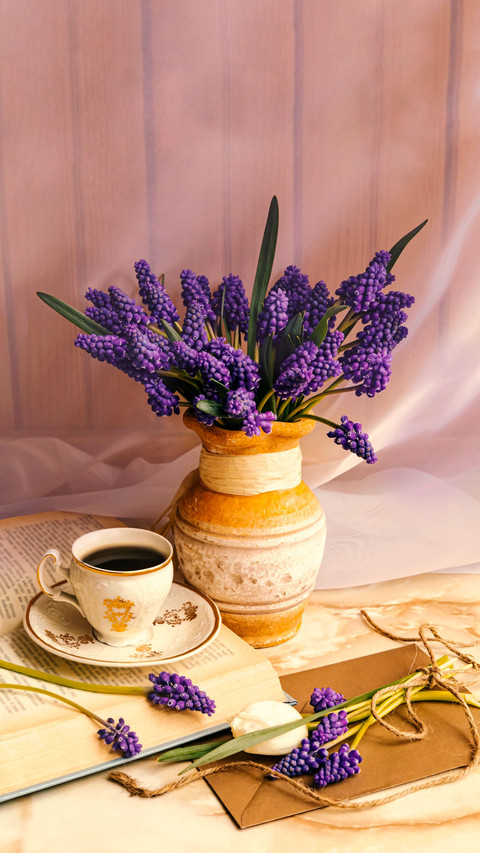 A Cup of coffee, book and romantic flowers screenshot