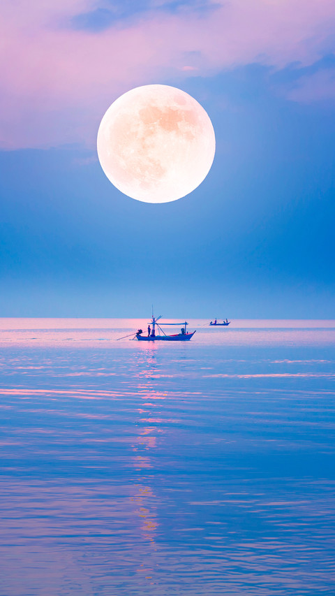 local fishing boat in the quiet sea on the full moon night screenshot