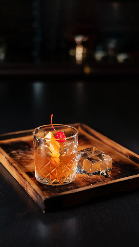 Negroni cocktail with lemon zest screenshot
