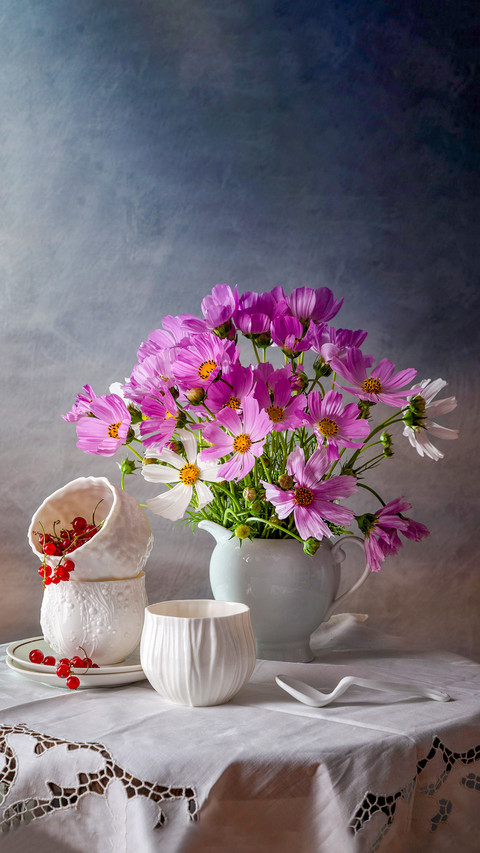 Modern still life with porcelain cups and a bouquet screenshot