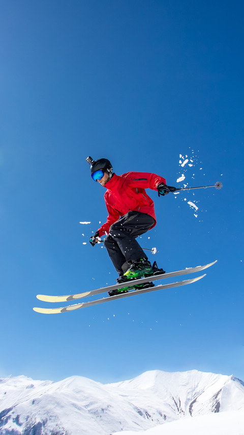 A Skier Jumps over a Mountain Skiing screenshot