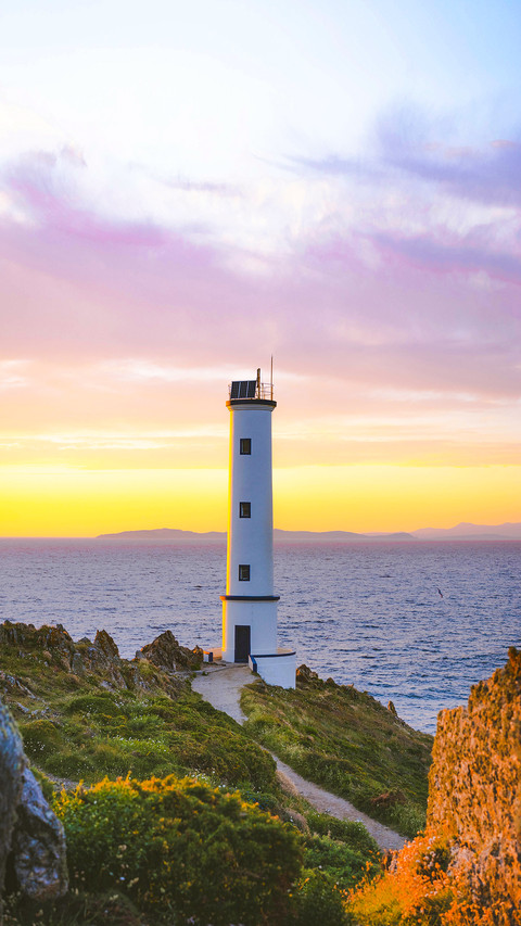 Galician lighthouse at the sea screenshot