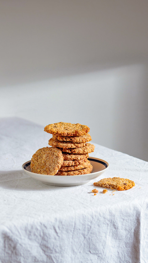 Stack of homemade oat cookies with shadows screenshot