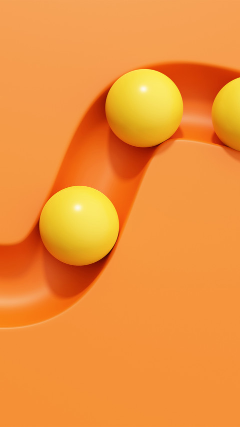 A bright yellow sphere on an orange background screenshot