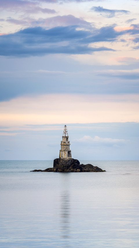 An amazing sunset with an lighthouse on the Black Sea coast screenshot
