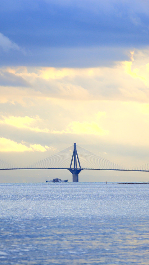 Sky above the Gulf of Corinth and Rio-Antirrio bridge screenshot