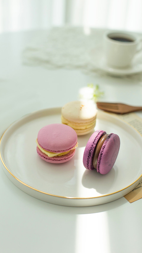 Sweet colorful macarons isolated on white background screenshot