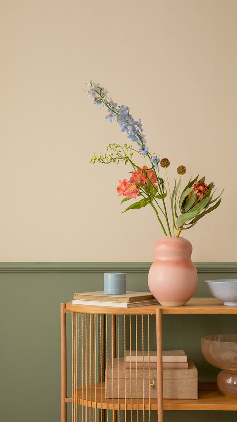 Cozy living room interior with wooden sideboard screenshot