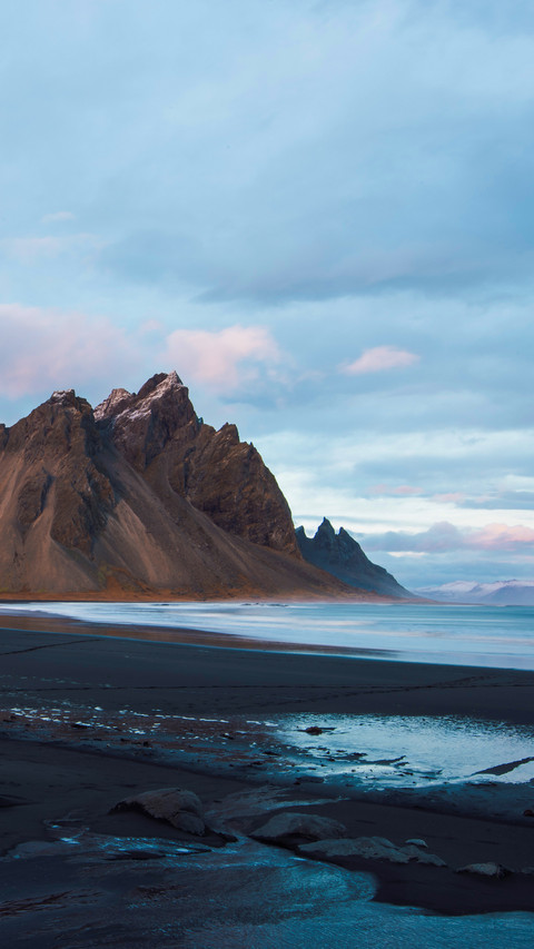 Beautiful sunset black sand beach in Iceland screenshot