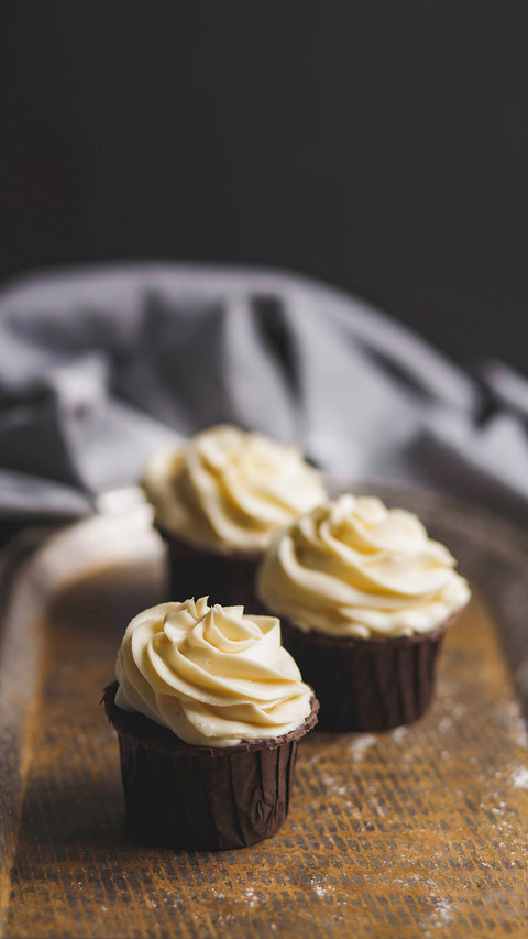 Three muffin with white powdered sugar screenshot