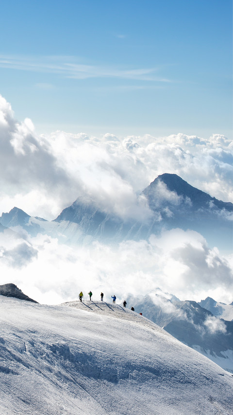 A Group of People Are Climbing The Snow Mountain screenshot
