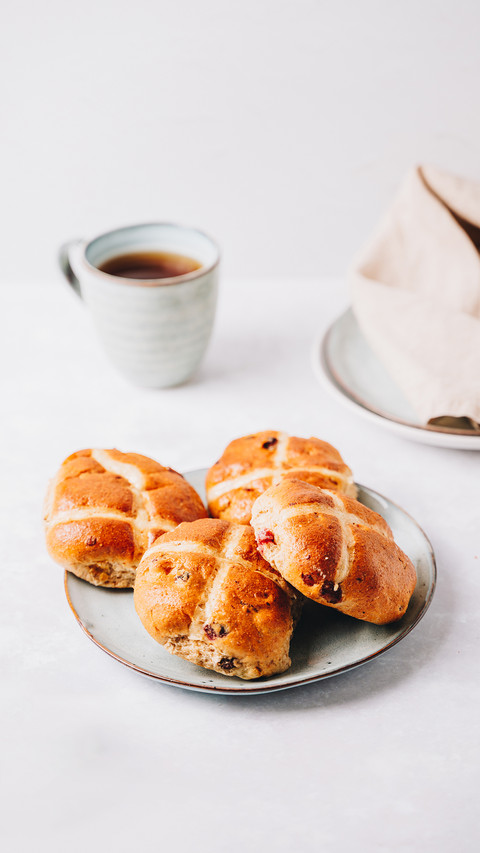 Traditional English Easter Hot Cross Buns on a plate screenshot