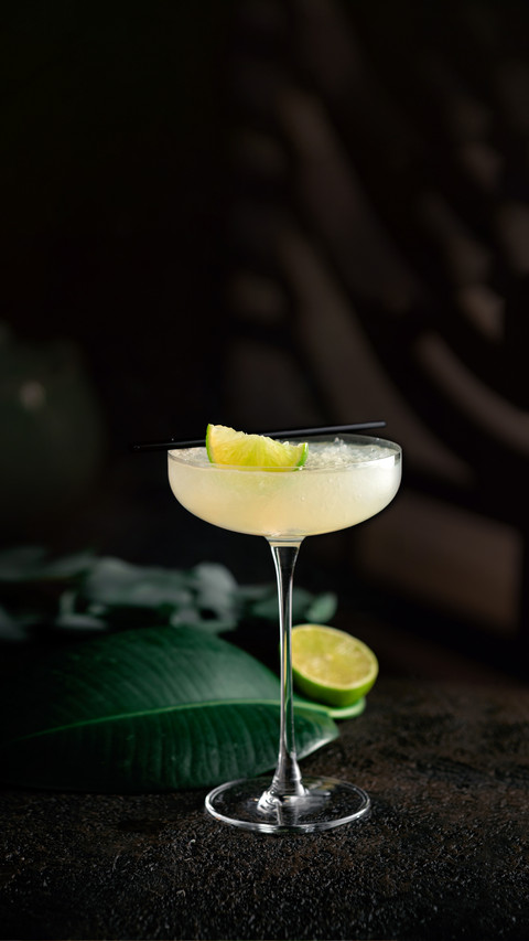 Daiquiri Cocktail in a Beautiful Glass with a Slice of Lime screenshot