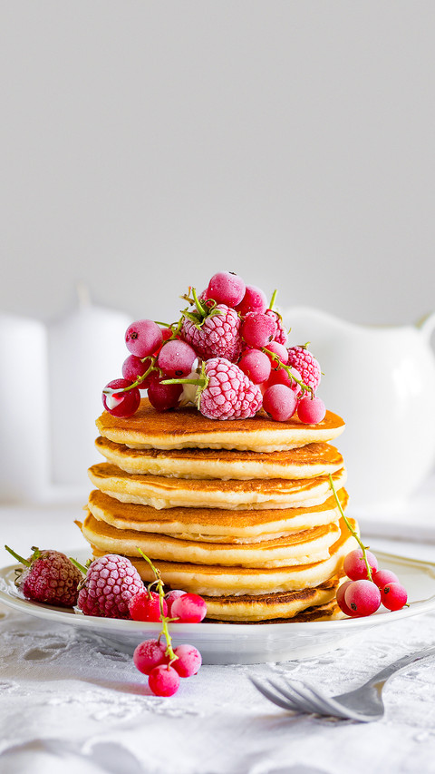 Stack of pancakes with raspberry screenshot