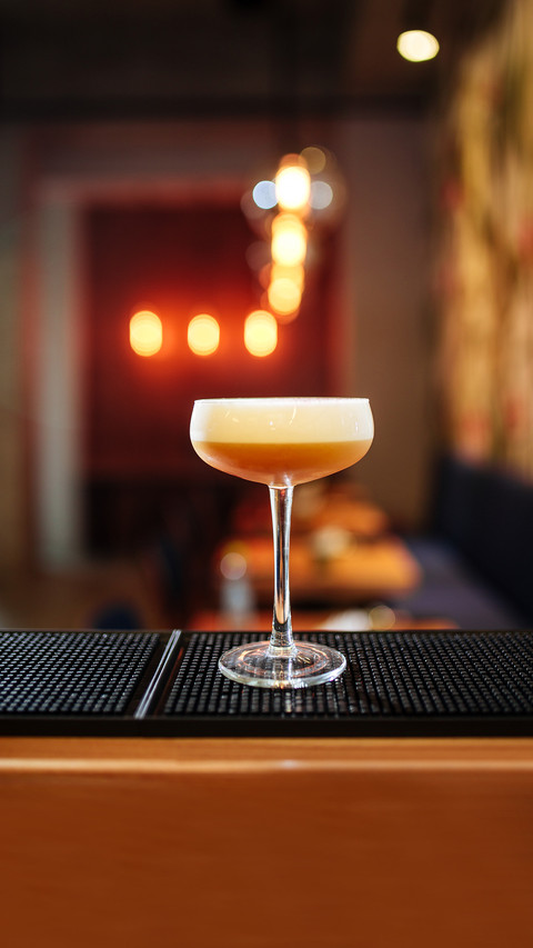 Delicious fruit alcohol cocktail in a margarita glass screenshot
