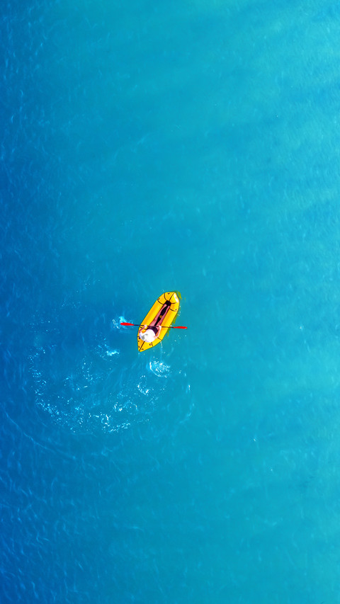 Yellow Packraft Rubber Boat and Turquoise Water Waves screenshot