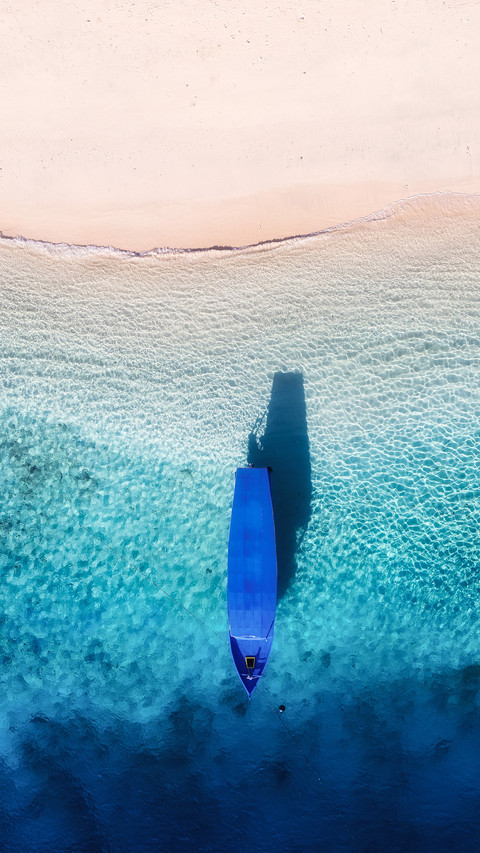 Boat near the beach. Seascape from drone screenshot