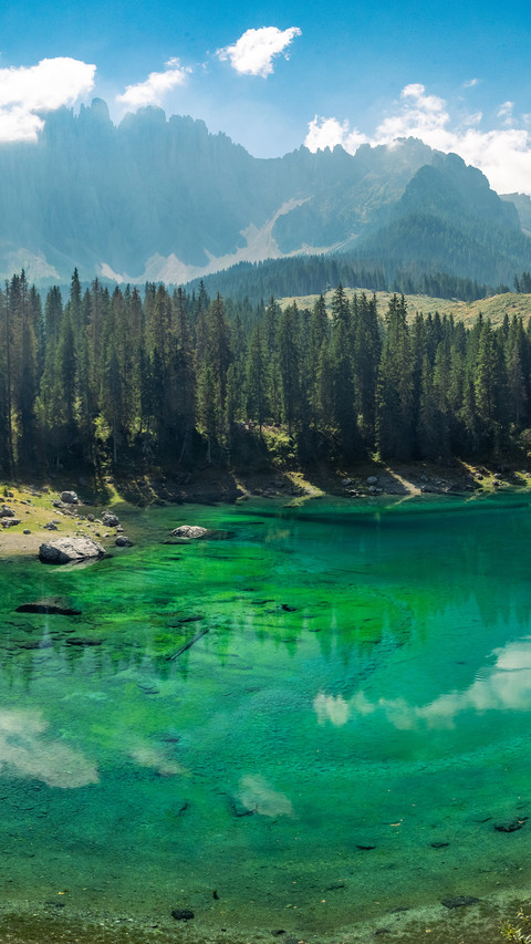 The serene scenery along the shore of lake donomiti screenshot