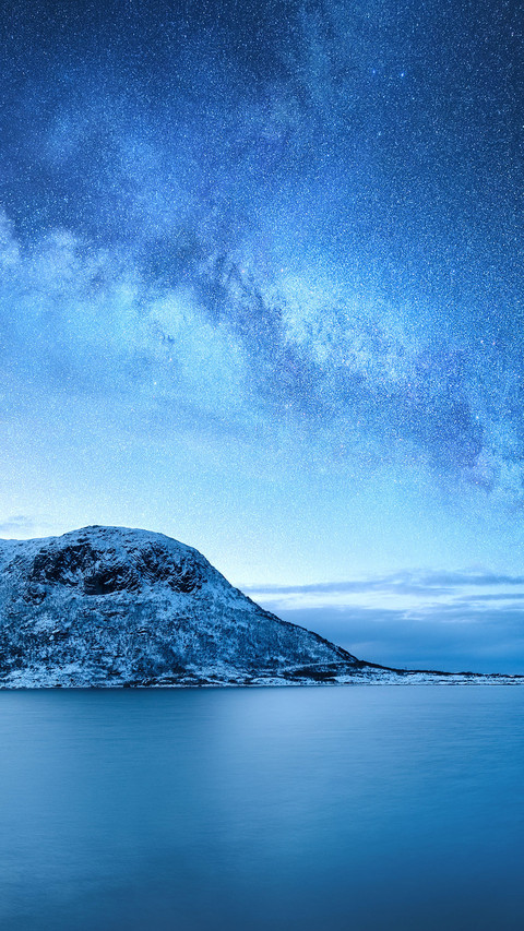Galaxy above the mountains and the ocean. Landscape at night screenshot