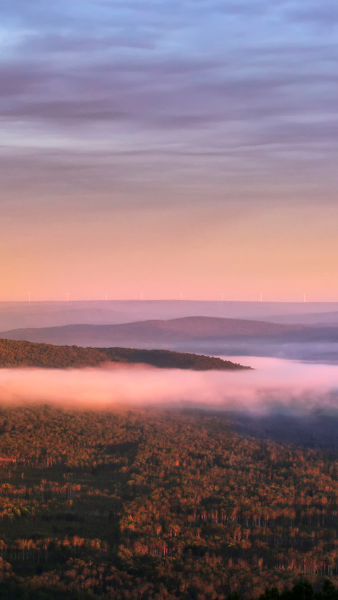 The mist rises over a thousand mountains concealing the screenshot