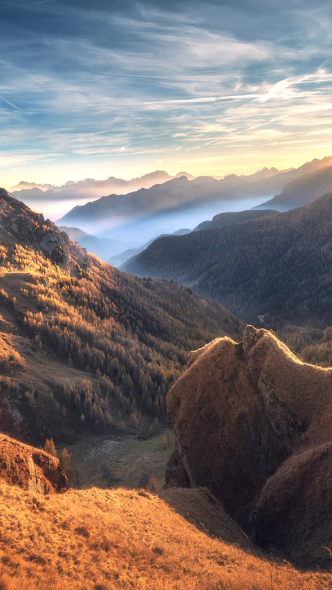 Mountains in fog at beautiful sunset in autumn screenshot