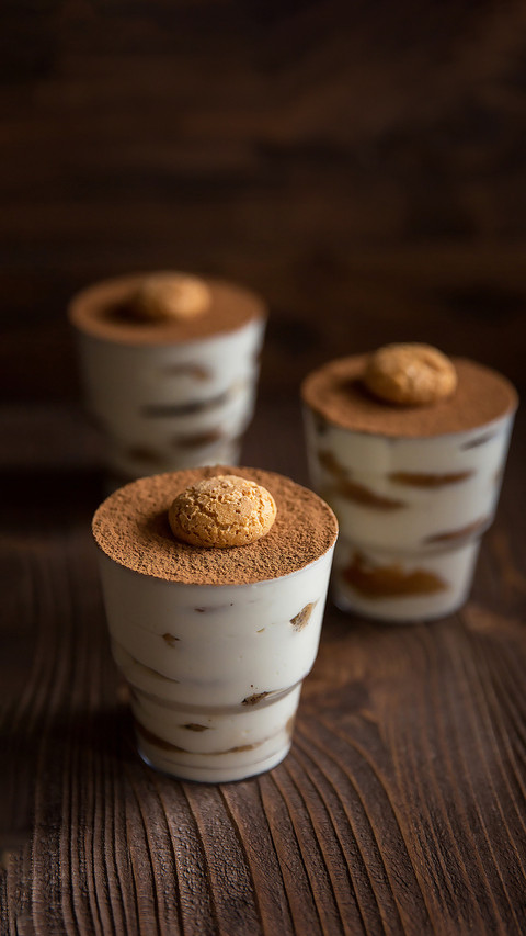 Dessert with coffee on a wooden background screenshot