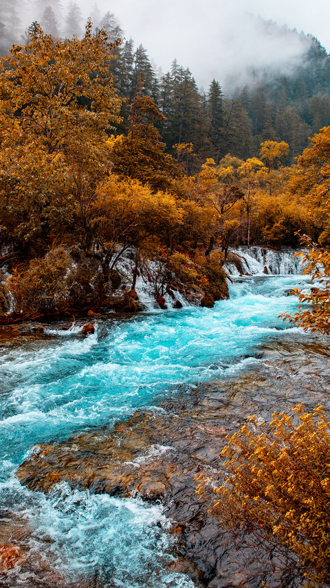 Glacial water flows over the rocks screenshot