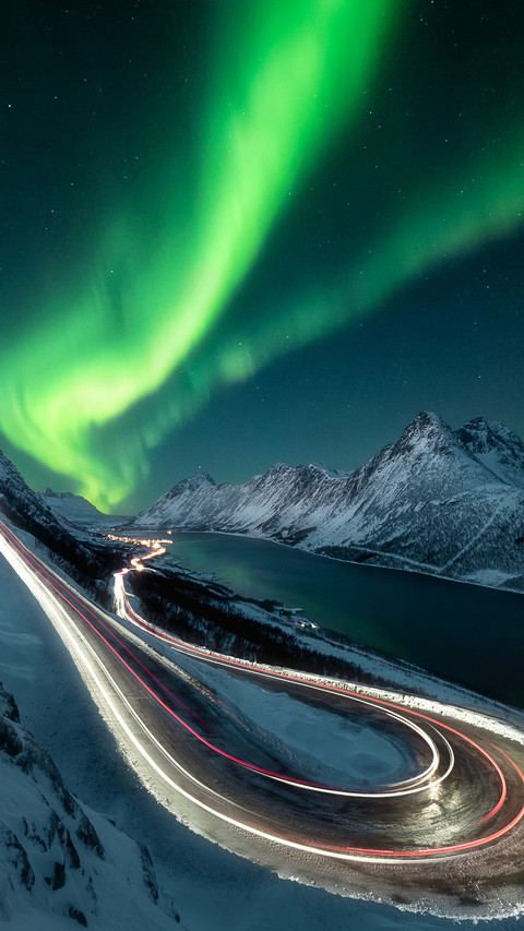 Aurora, starry sky, and snow mountains screenshot