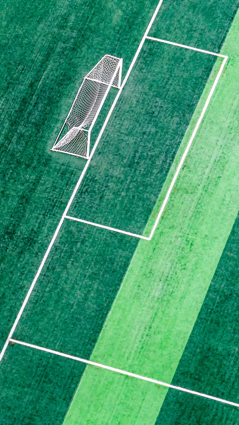 Aerial photography of green football field screenshot