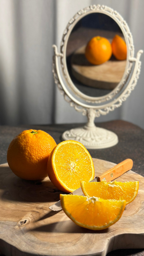 Still life Photography of Orange Slice on the tray screenshot