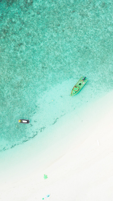 Aerial drone view of picture perfect beach screenshot