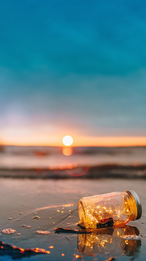 Jar at the beach during sunset screenshot