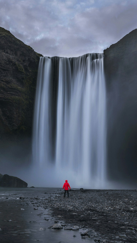 Man Standing Under The Waterfall screenshot