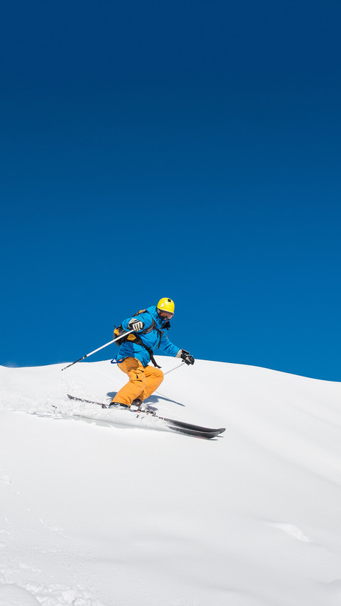 A professional freeride skier is skiing in the Carpathians screenshot
