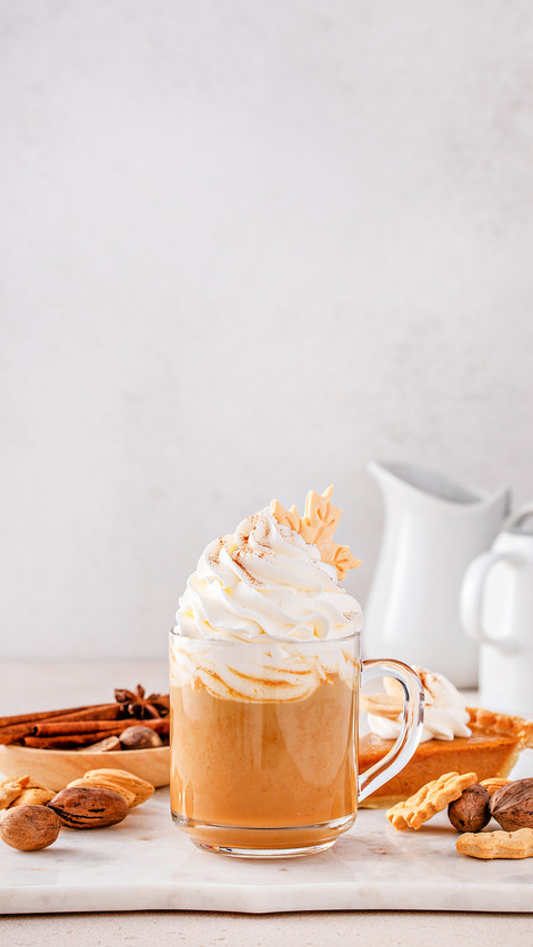 Pumpkin spice latte topped with whipped cream screenshot