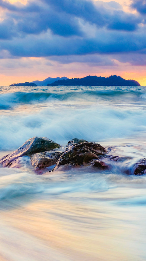 Beautiful seascape on sunset background screenshot