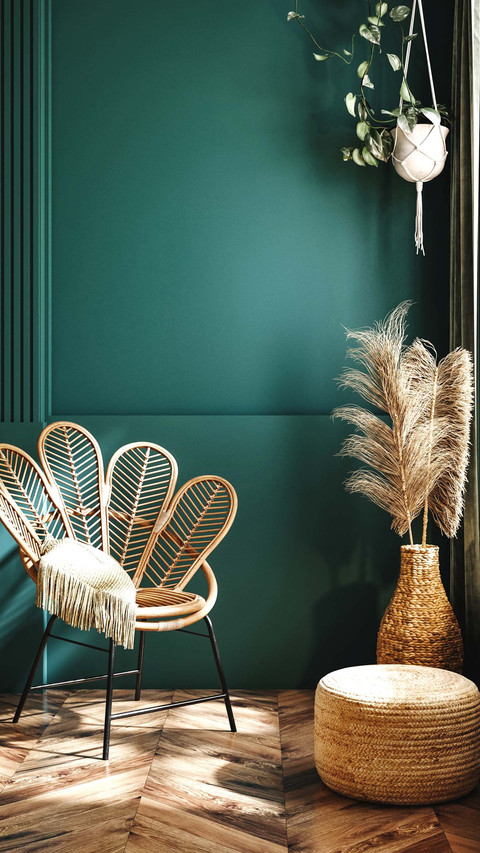 Rattan armchair, pouf and wicker decor in living room screenshot