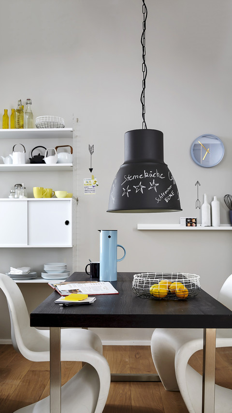 Black and white furniture and writing on chalkboard lamp screenshot
