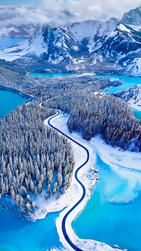Overhead view of a road through a snow covered landscape screenshot