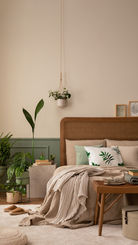Warm and cozy bedroom interior with mock up poster frame screenshot