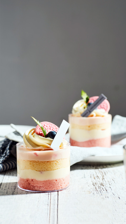 Mousse cake with fresh blueberries and cookies screenshot