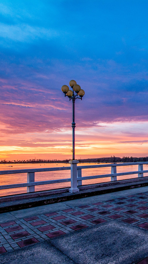 Bridge Thailand in evening under blue sky screenshot