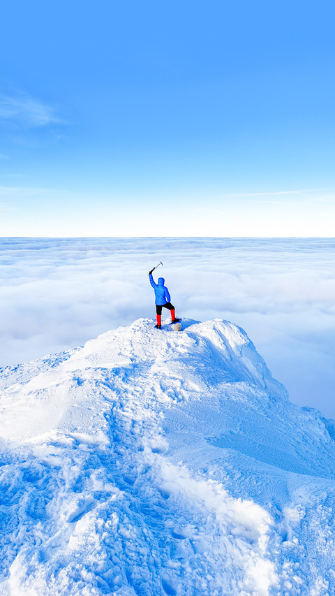 Epic scene of man at mountain top as symbol of life success screenshot