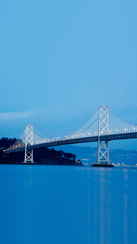 The Bay Bridge at night in San Francisco, California screenshot