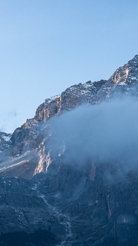 Snowy peaks bathed in clear sunlight, embracing the scenic b screenshot