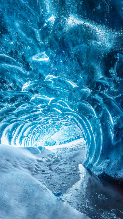 Blue crystal ice cave entrance and an underground river screenshot