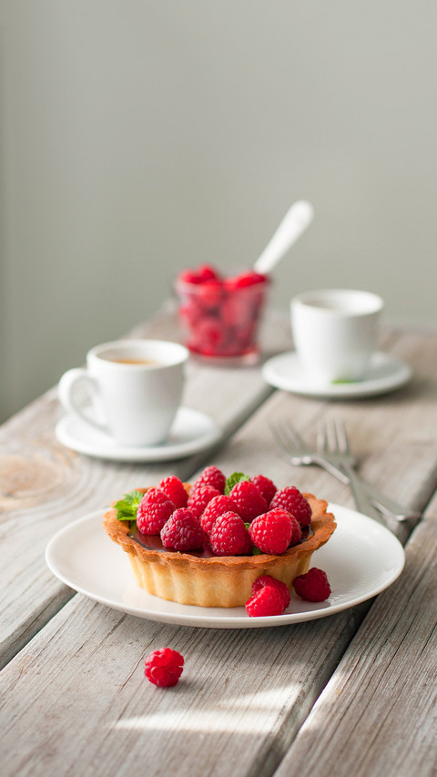 Chocolate and Raspberry tart on a white plate screenshot