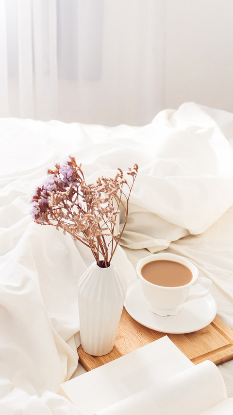 Breakfast on dark wooden vintage tray in bed screenshot