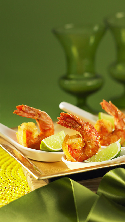 Crispy prawns with lime wedges screenshot