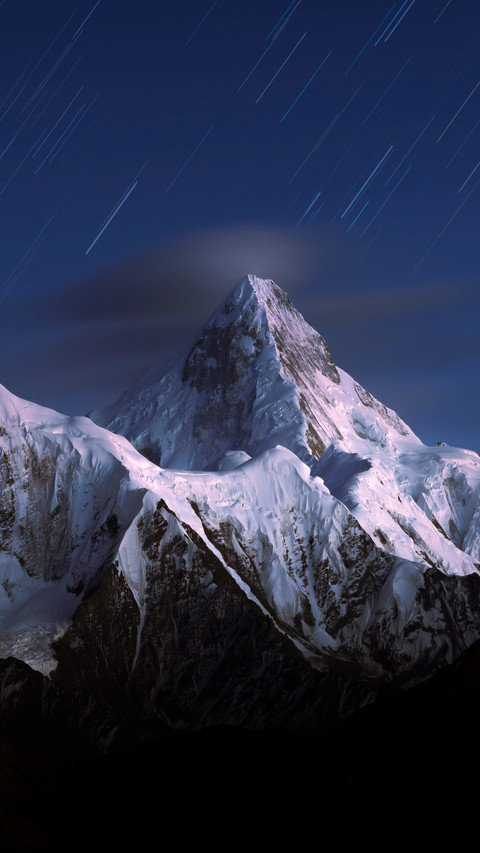 A solitary peak stands still in the clouds screenshot